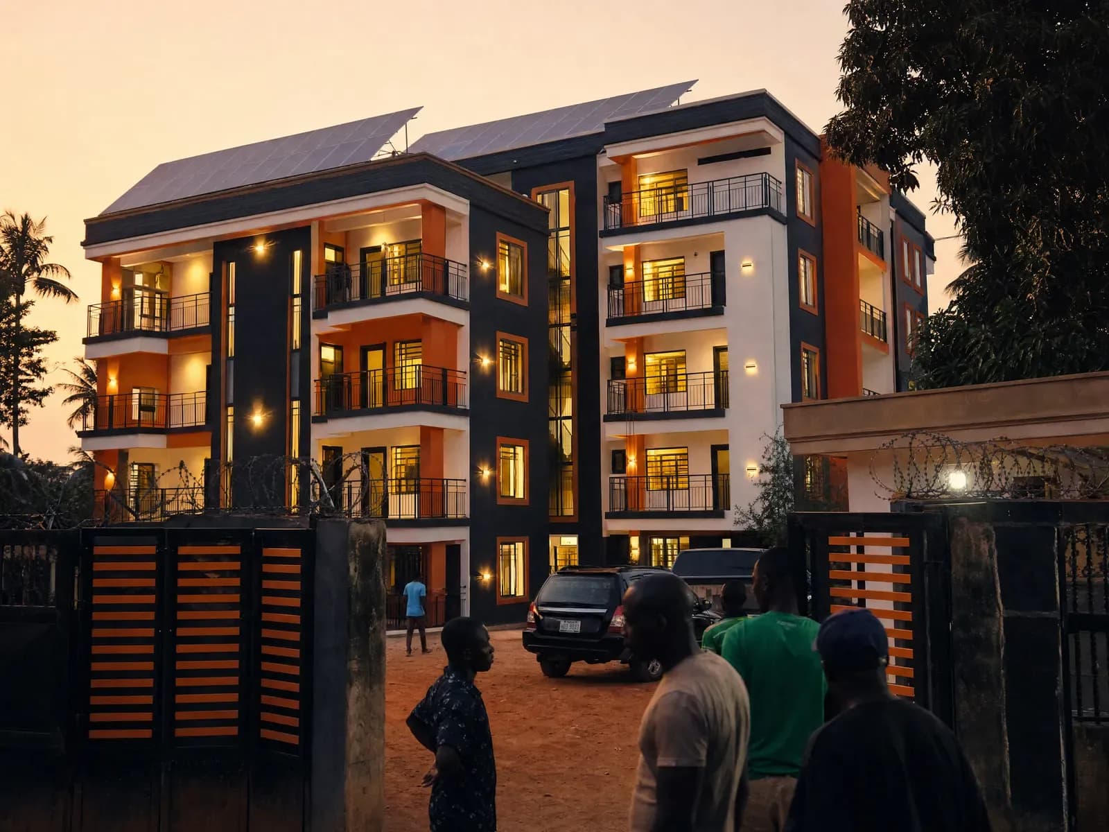 A 24-unit apartment block with every flat lit at dusk