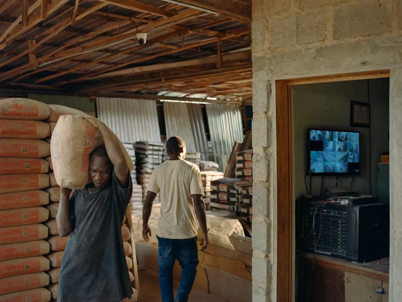 A building-materials warehouse with a dome camera on the rafter